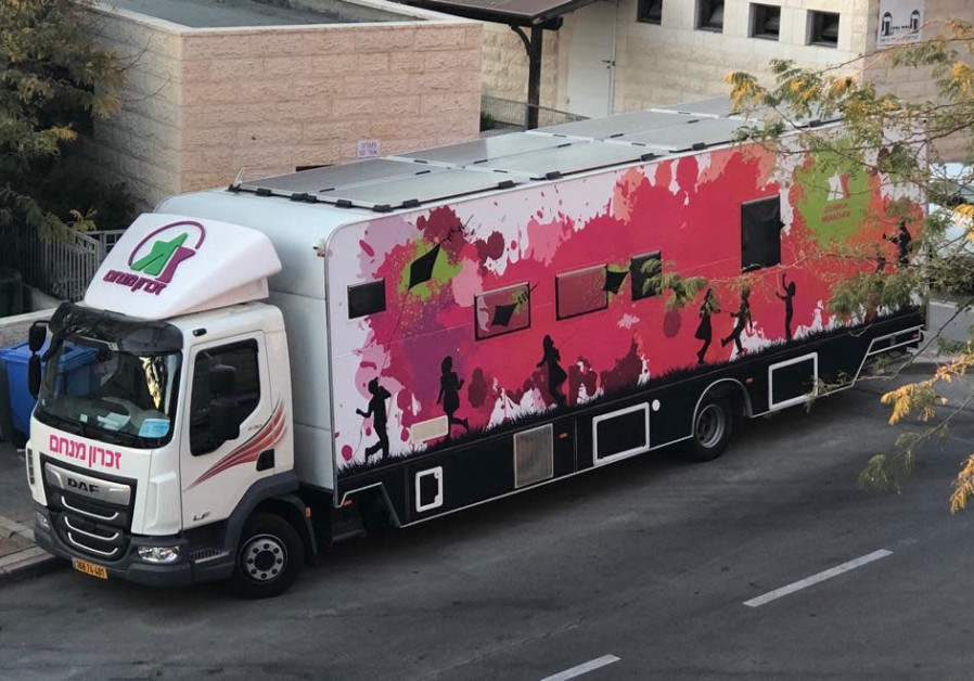 The donation truck that will travel all over Israel to collect hair donations from women. (Photo Credit: Zichron Menachem)