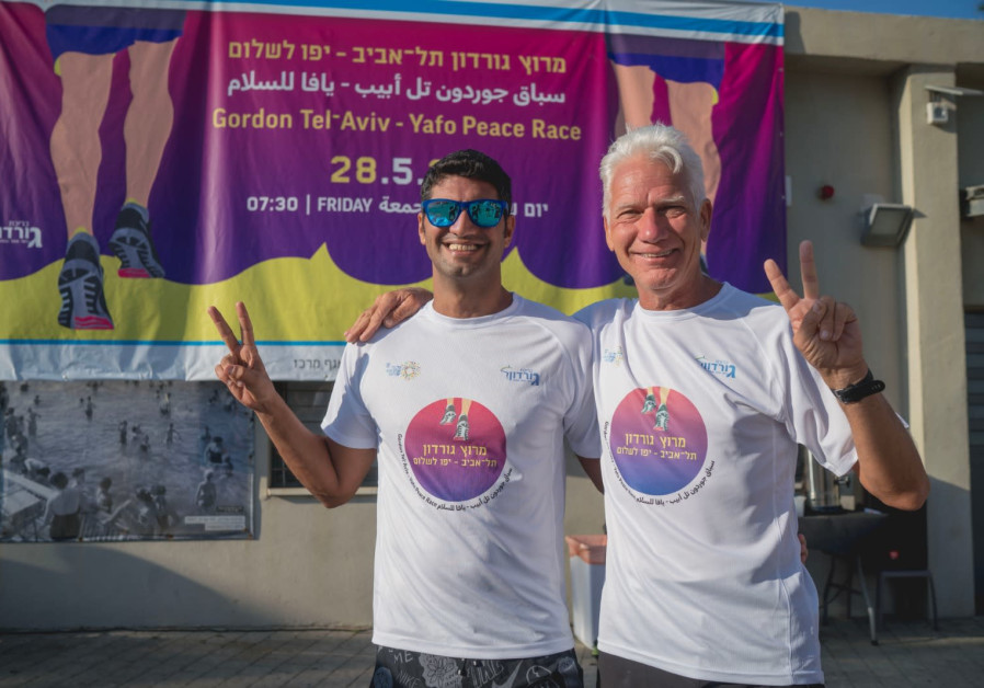  Over 250 people attended a 7-kilometer "Peace Race" on Friday morning in Tel Aviv and Jaffa in a sporting initiative to boost coexistence in Israel amid ongoing tensions. (Credit: Ilan Spira)