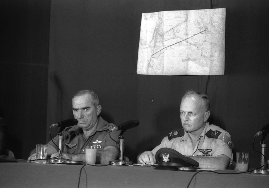  IDF CHIEF of staff Rafael ‘Raful’ Eitan and Air Force commander David Ivri inform journalists about the operation, June 9, 1981. (Credit: HERMAN CHANANIA/GPO)