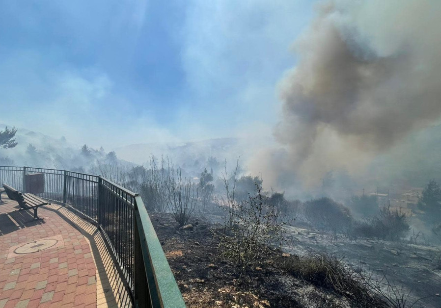 A fire in Tzur Hadassah rages uncontrollably as firefighters work to extinguish it, June 4, 2021. (Credit: JUDEA AND SAMARIA FIRE DEPARMENT)