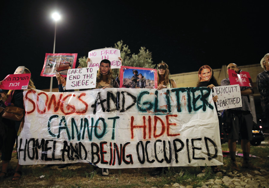 BDS MOVEMENT supporters protest outside the Tel Aviv venue of the Eurovision Song Contest final, in May 2019. (AMMAR AWAD / REUTERS)