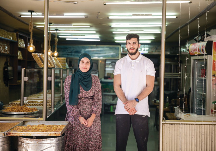 JEWELRY ARTIST and fashion designer Alaa Edris's (right) collaboration with Al-Najah bakery shop Nazmi Abu Sabikh delivered some flavorful and aesthetic creations. (KEREN ROSENBERG)