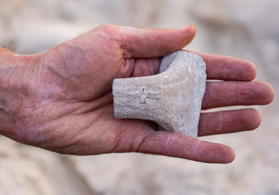 A jar handle stamped with “For the King." (Photo credit: YANIV BERMAN/ISRAELI ANTIQUITIES AUTHORITY)