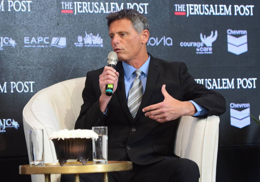 Theranica CEO Alon Ironi speaks at a recent Jerusalem Post conference (Credit: Avshalom Sassoni)