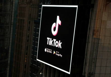 The TikTok logo is seen on a screen over Times Square in New York City, U.S., March 6, 2020