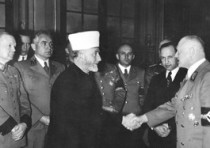 HAJ AMIN AL-HUSSEINI greets a WW2 Nazi official