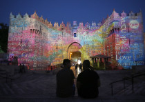 Damascus Gate, which leads to Jerusalem’s Old City, is projected with the word 'love'