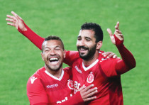 HAPOEL TEL AVIV defender Idan Cohen (right) celebrates with teammate Claudemir