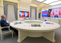 Russia's President Vladimir Putin speaks with Turkey's President Tayyip Erdogan and Iran's President Hassan Rouhani during a video conference call, dedicated to the conflict in Syria, in Moscow, Russia July 1, 2020