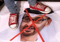 Palestinians protest against the deal between Israel and the UAE in the West Bank city of Hebron, August 16, 2020
