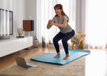  Woman doing exercise at home
