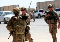 U.S. soldiers are seen during a handover ceremony of Taji military base from US-led coalition troops to Iraqi security forces, in the base north of Baghdad, Iraq August 23, 2020.