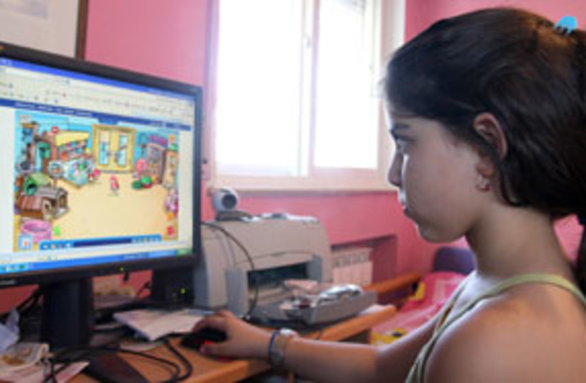 A schoolgirl checks out the Web (photo credit: Ariel Jerozolimski)