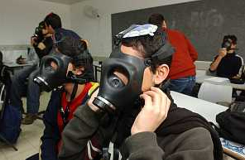 gas mask drill 2 298.88 (photo credit: Ariel Jerozolimski)