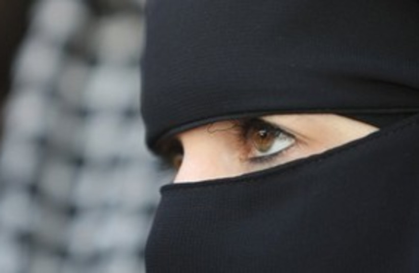 muslim woman burka 311 AP (photo credit: Associated Press)
