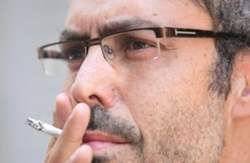 man smoking 311 (photo credit: Marc Israel Sellem/The Jerusalem Post)