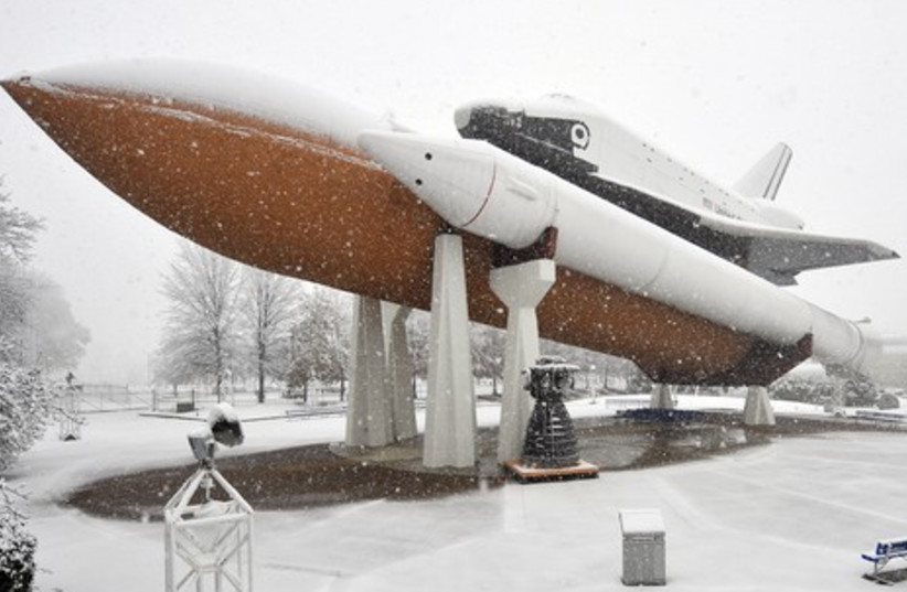 Space shuttle covered in snow in Huntsville, Ala