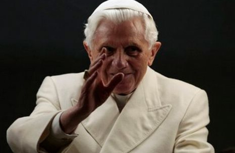 Pope Benedict XVI blesses the faithful