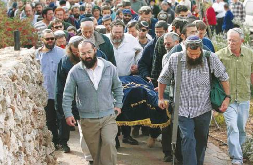 Funeral settlers Kiryat Arba terror victims 521 (do not publish again) (photo credit: Flash 90)