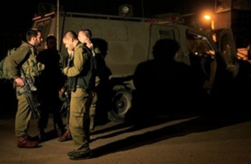 IDF soldiers on Gaza border 311 (photo credit: AP)