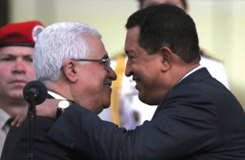 Venezuelan embrace (photo credit: Associated Press)