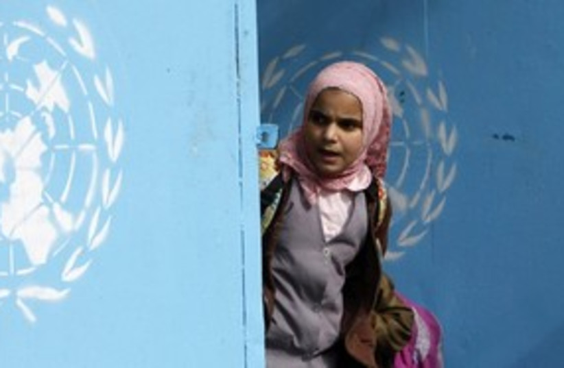 Palestinian girl at UNRWA school 311 Reu (photo credit: Ali Hashisho / Reuters)