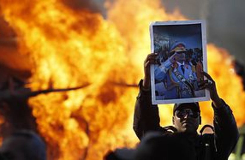 pro gaddafis protest 311 (photo credit: REUTERS)
