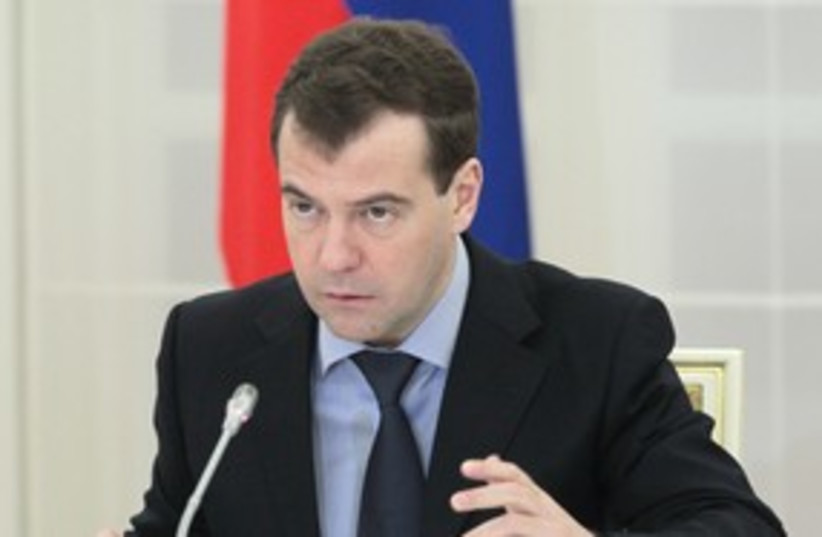 Russia's President Medvedev (R) 311  (photo credit: RIA Novosti / Reuters)