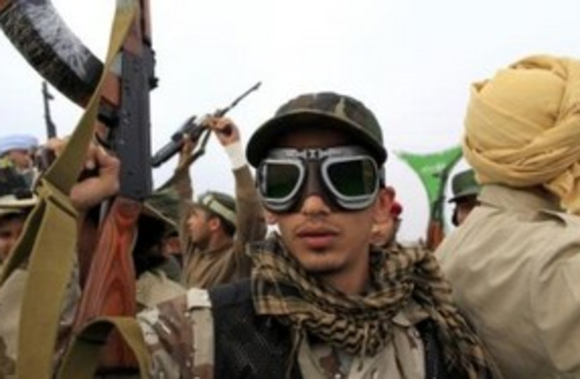 Gaddafi Forces 311 (R) (photo credit: REUTERS)