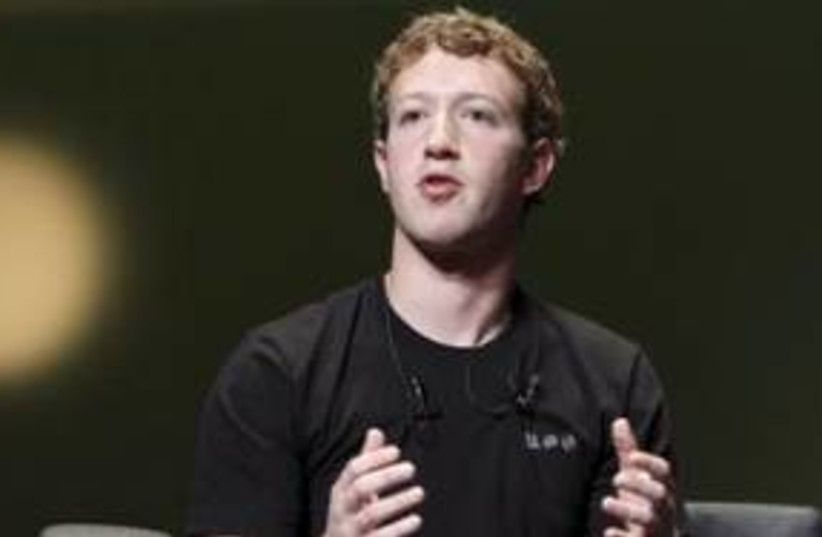 Facebook CEO Mark Zuckerberg 311 (R) (photo credit: REUTERS/Sebastien Nogier)