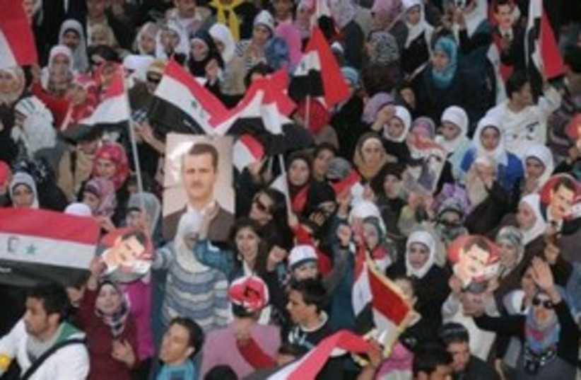 Supporters of Syrian President Assad in Aleppo 311 (R) (photo credit: REUTERS/George Ourfalian)