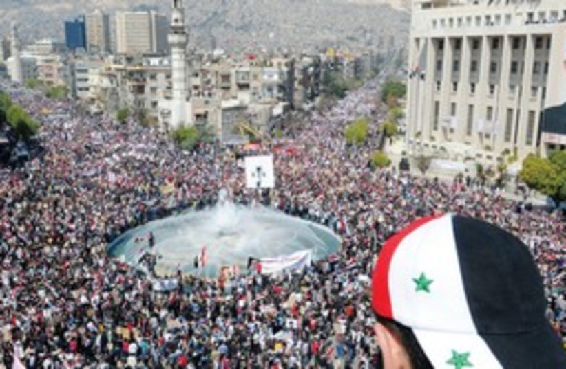 Bowing To Pressure Assad Fires Cabinet The Jerusalem Post