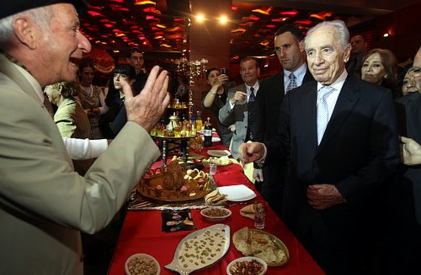 President Shimon Peres celebrating Minouna
