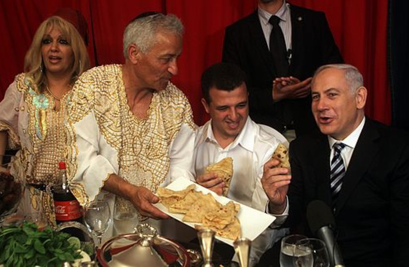 Peres, Barkat and Amar celebrating Minouna