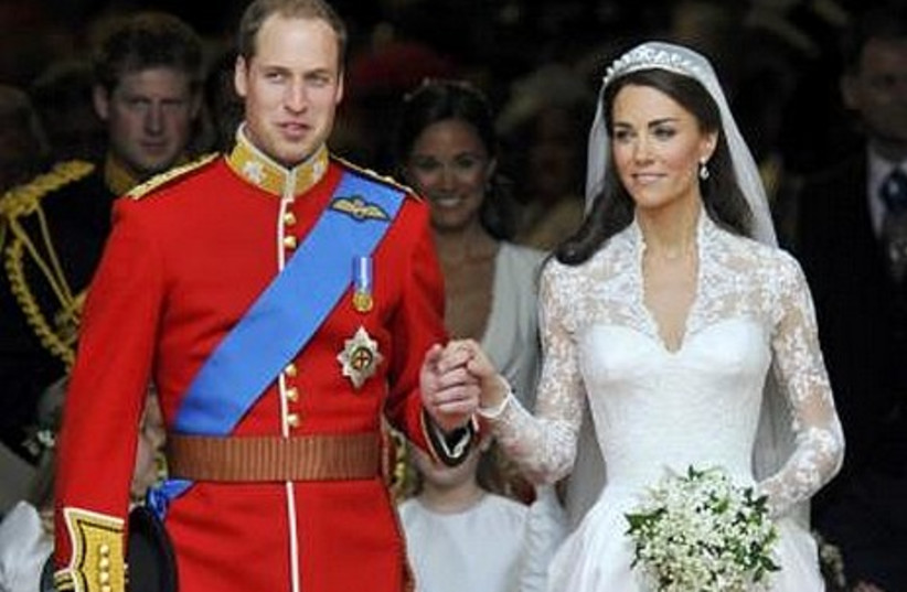Britain's Prince William, Kate Middleton walk out.
