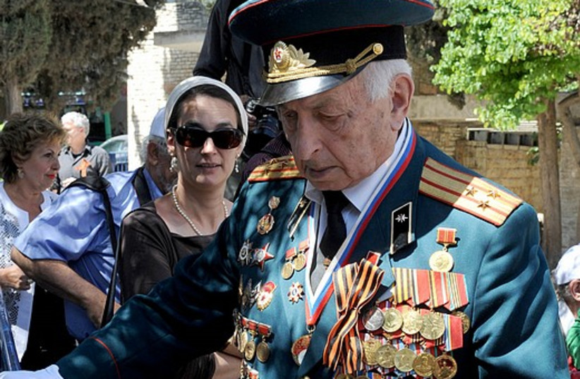 A World War II Veteran marches on VE Day