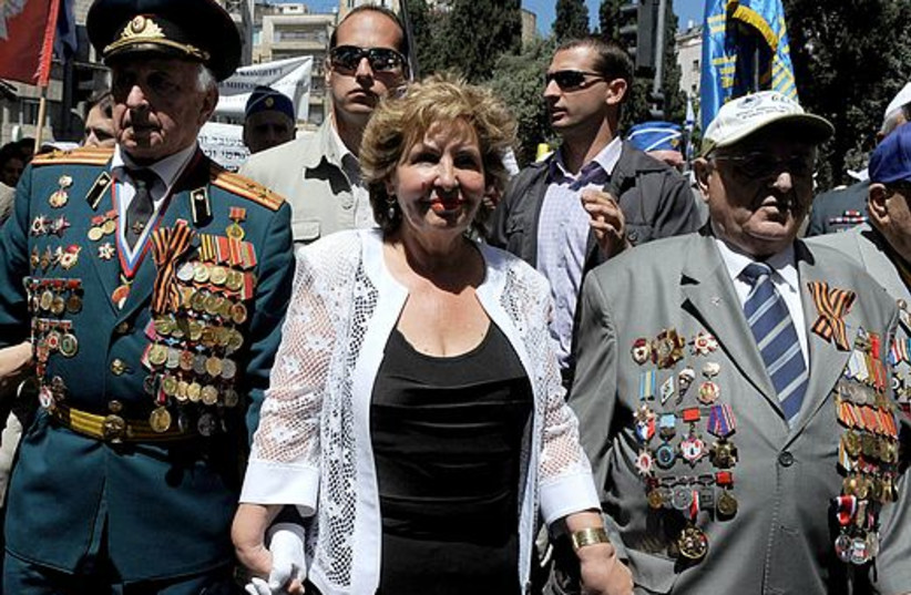 Sofa Landver marches with World War II veterans