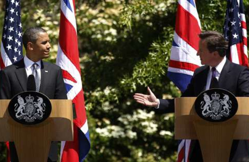 Obama and Cameron Press conference 521 (photo credit: REUTERS/Kevin Lamarque)