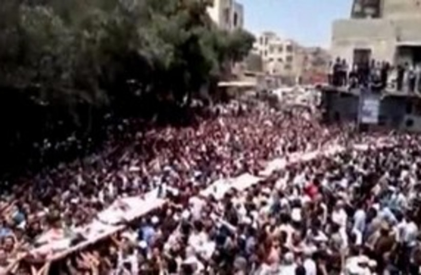 Syrian funeral protests 311 R (photo credit: REUTERS)