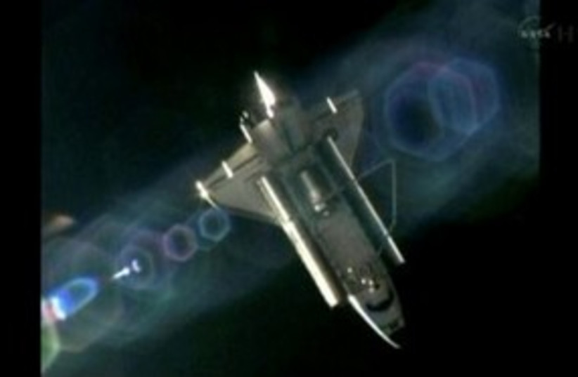 space shuttle atlantis_311 reuters (photo credit: REUTERS/Nasa TV)