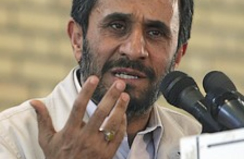 ahmadinejad talks hand  (photo credit: AP)