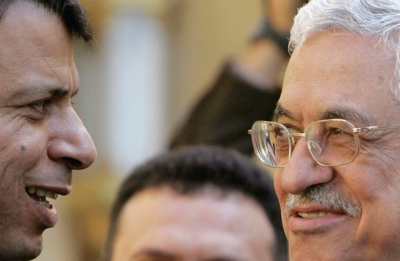 Dahlan & Mahmoud Abbas311 (photo credit: TARA TODRAS-WHITEHILL / REUTERS)