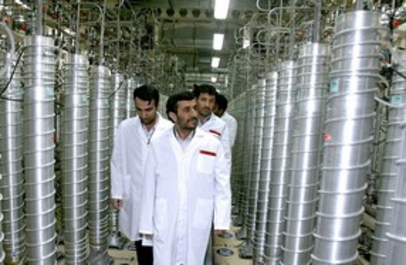 Iranian President Ahmadinejad at nuclear facility 311 (R) (photo credit: Ho New / Reuters)