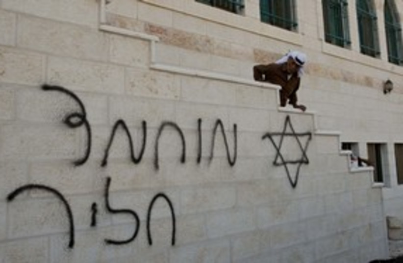 price tag graffiti mosque 311 R (photo credit: REUTERS/Abed Omar Qusini)