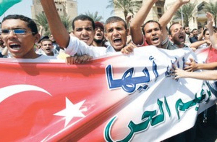 Egyptian in support of Erdogan 311 (photo credit: Mohamed Abd El-Ghany/Reuters)