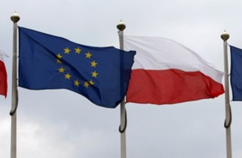 Polish and UN flag 311 (photo credit: REUTERS/Kacper Pempel)