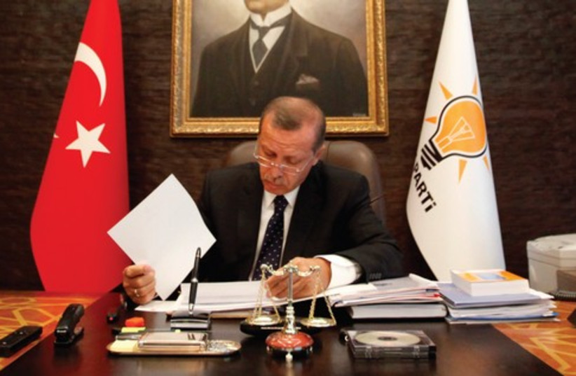 Erdogan in office 521 (photo credit: UMIT BEKTAS / REUTERS)
