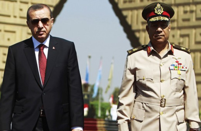 Erdogan visits Egypt 521 (photo credit: AMR ABDALAH DALSH / REUTERS)
