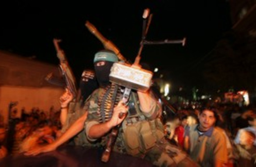 Hamas militants celebrate 311 R (photo credit: REUTERS/Mohammed Salem )