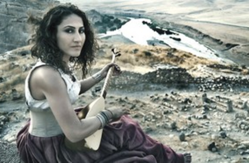 woman with oud 311 (photo credit: Courtesy of Sadat Mehader)
